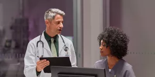 Healthcare professionals at desk